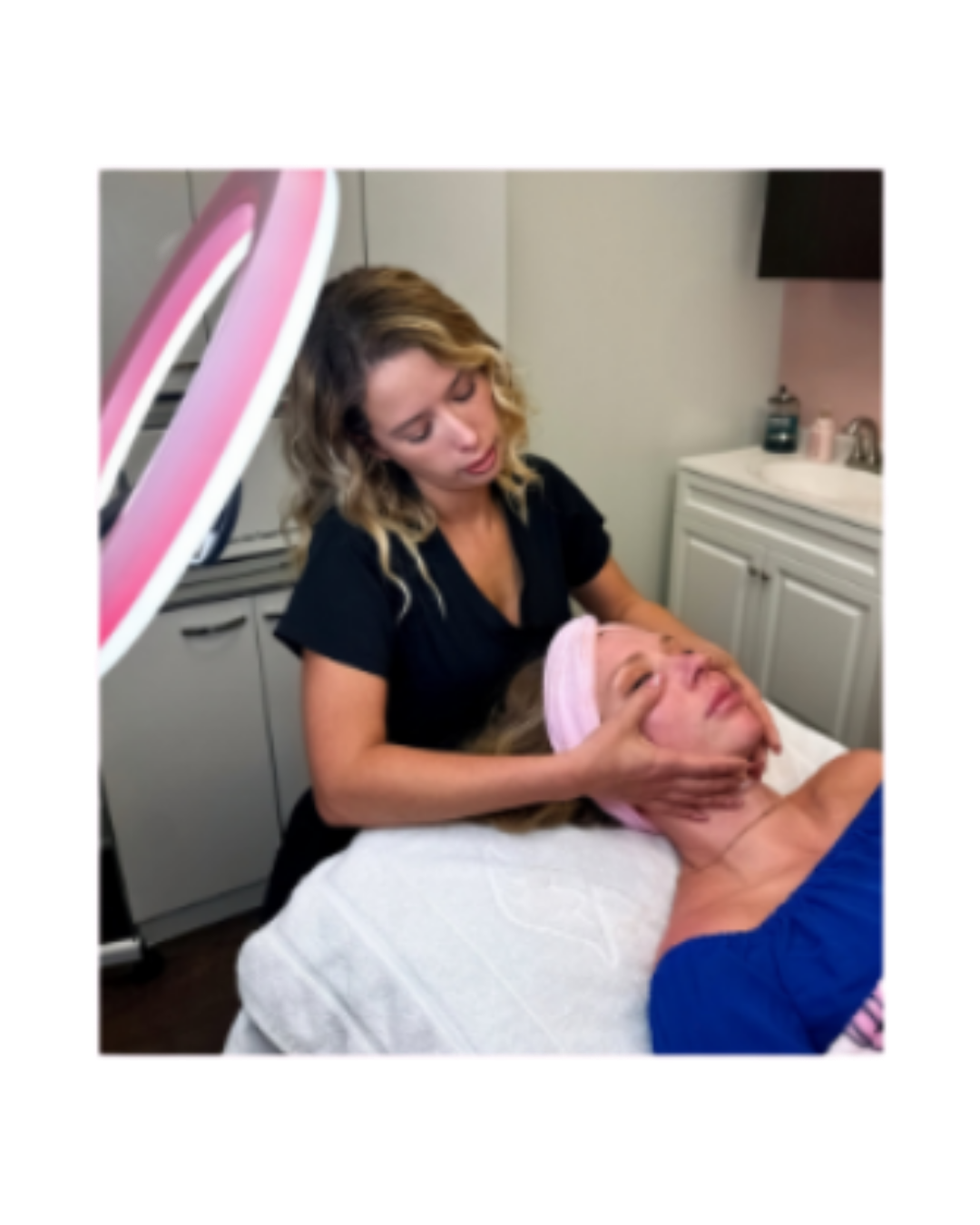 Taylor performing a facial treatment
